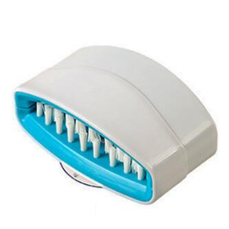 A creative kitchen cleaning brush with suction cup, perfect for washing knives, forks, chopsticks, fruits, and vegetables easily.