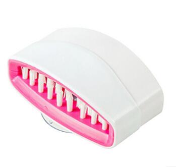 A creative kitchen cleaning brush with suction cup, perfect for washing knives, forks, chopsticks, fruits, and vegetables easily.