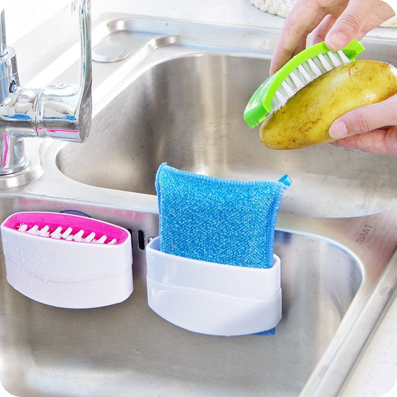 A creative kitchen cleaning brush with suction cup, perfect for washing knives, forks, chopsticks, fruits, and vegetables easily.