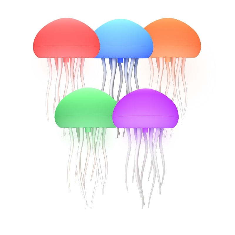 A soft glowing jellyfish lamp that gently moves like the sea, creating a peaceful and relaxing atmosphere perfect for your bedside or desk.
