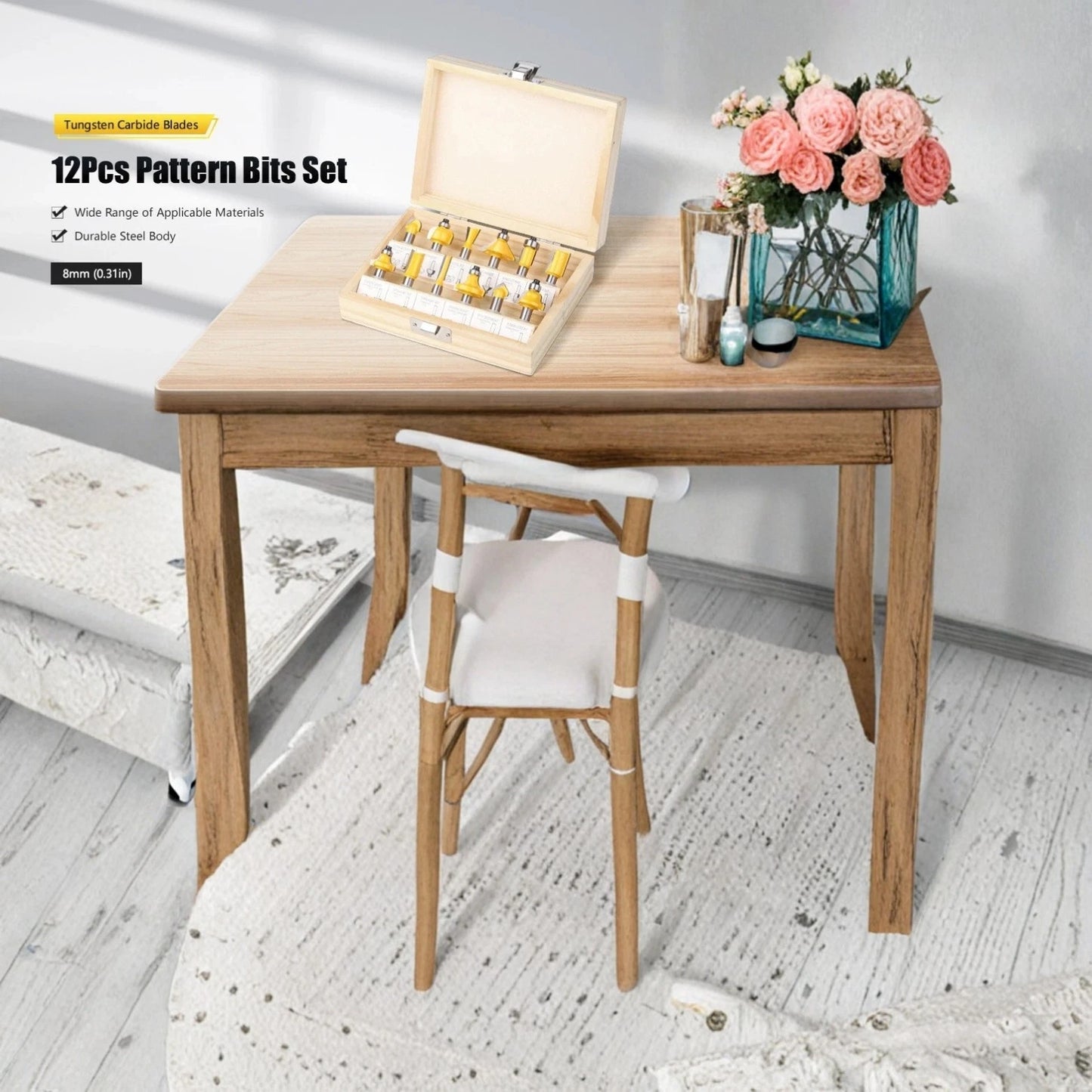 Wooden table with chair, 12-piece pattern bits set, and vase of flowers on a light gray floor.